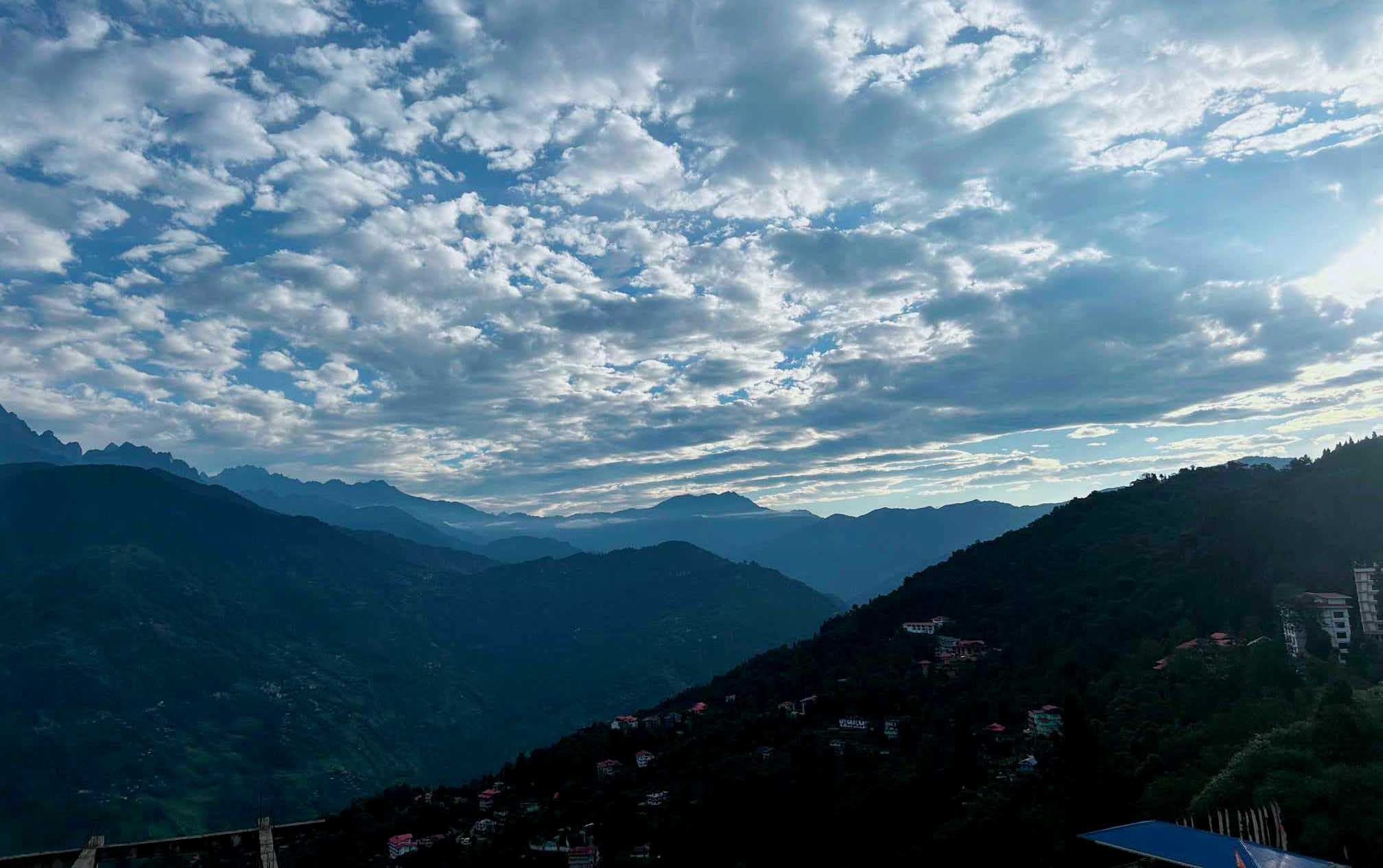 Raft of white cloud under the blue sky